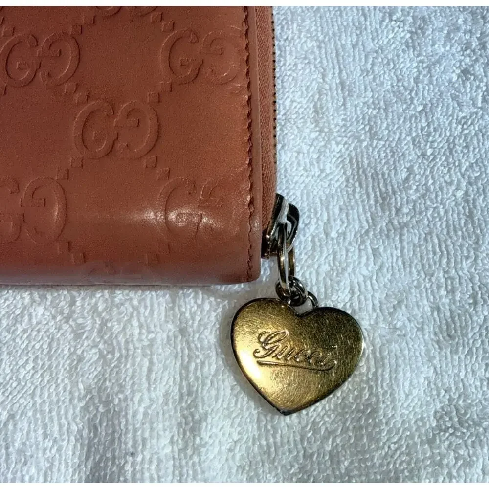 Gucci Guccissima Zip Around Wallet in Mauve Pink